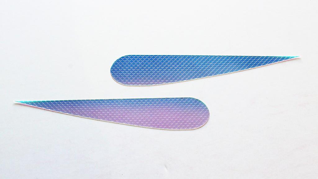Wings with Embossed Scale Pattern
